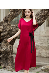 V-neck silk midi dress with short sleeves and side tie detail for elegant everyday wear